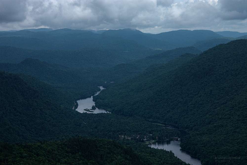 river and forest viewed from the top of a mountains